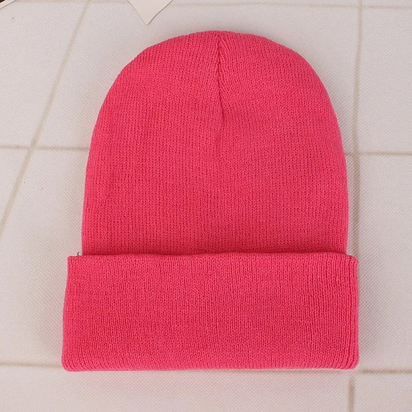 Bonnet tricoté rose