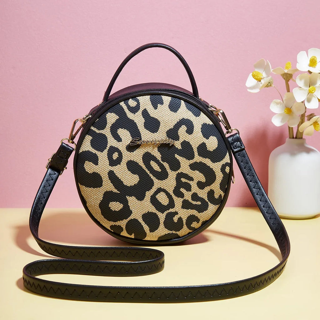 Sac rond imprimé léopard noir