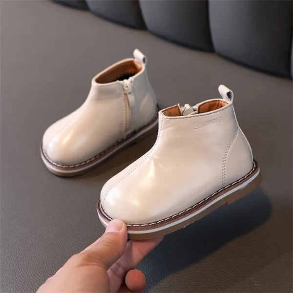 Bottes en cuir pour enfant de couleur beige